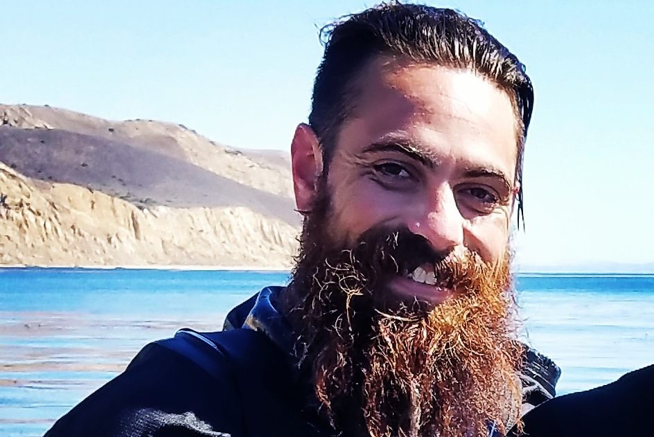 Bearded Gentleman Smiling at Camera after a dive