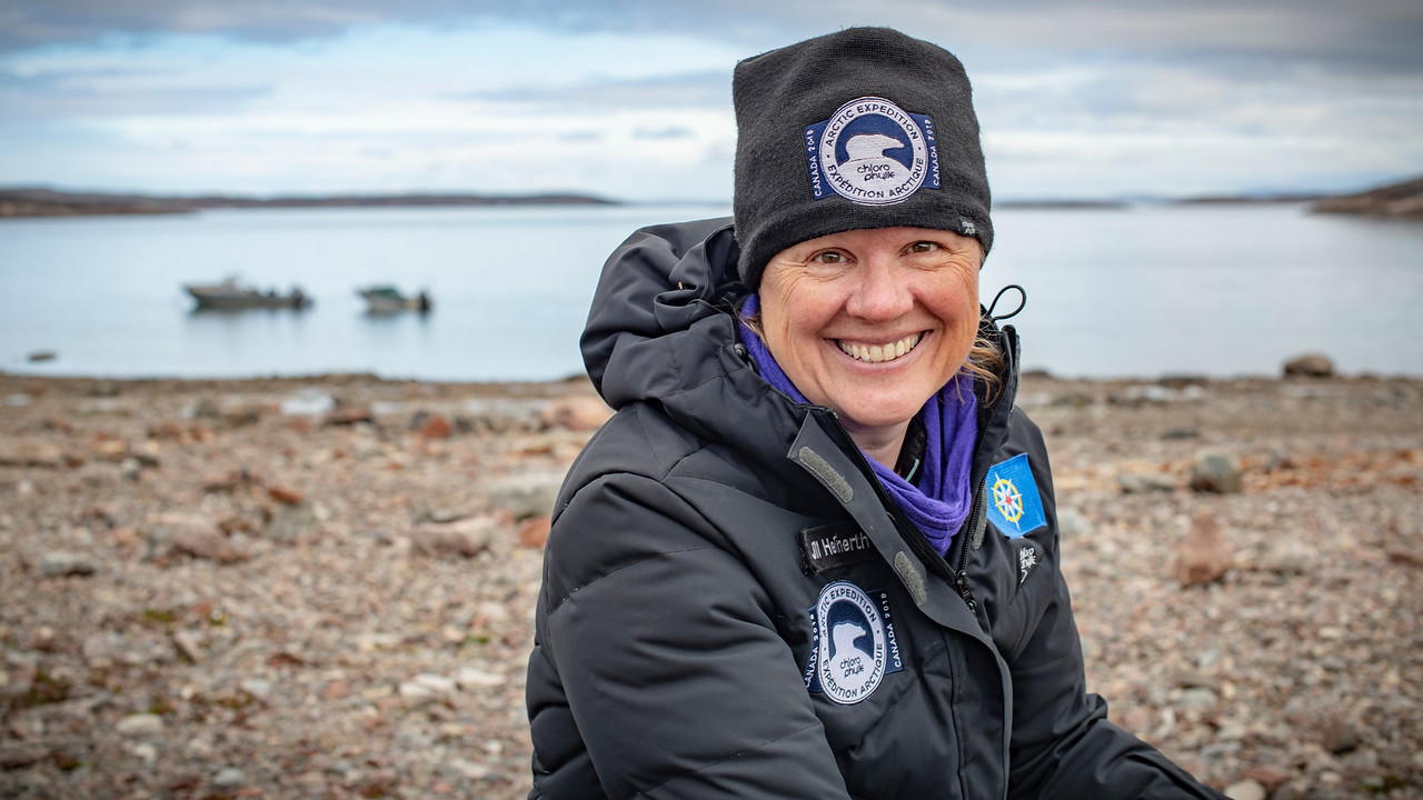 Jill Heinerth on a rocky beath
